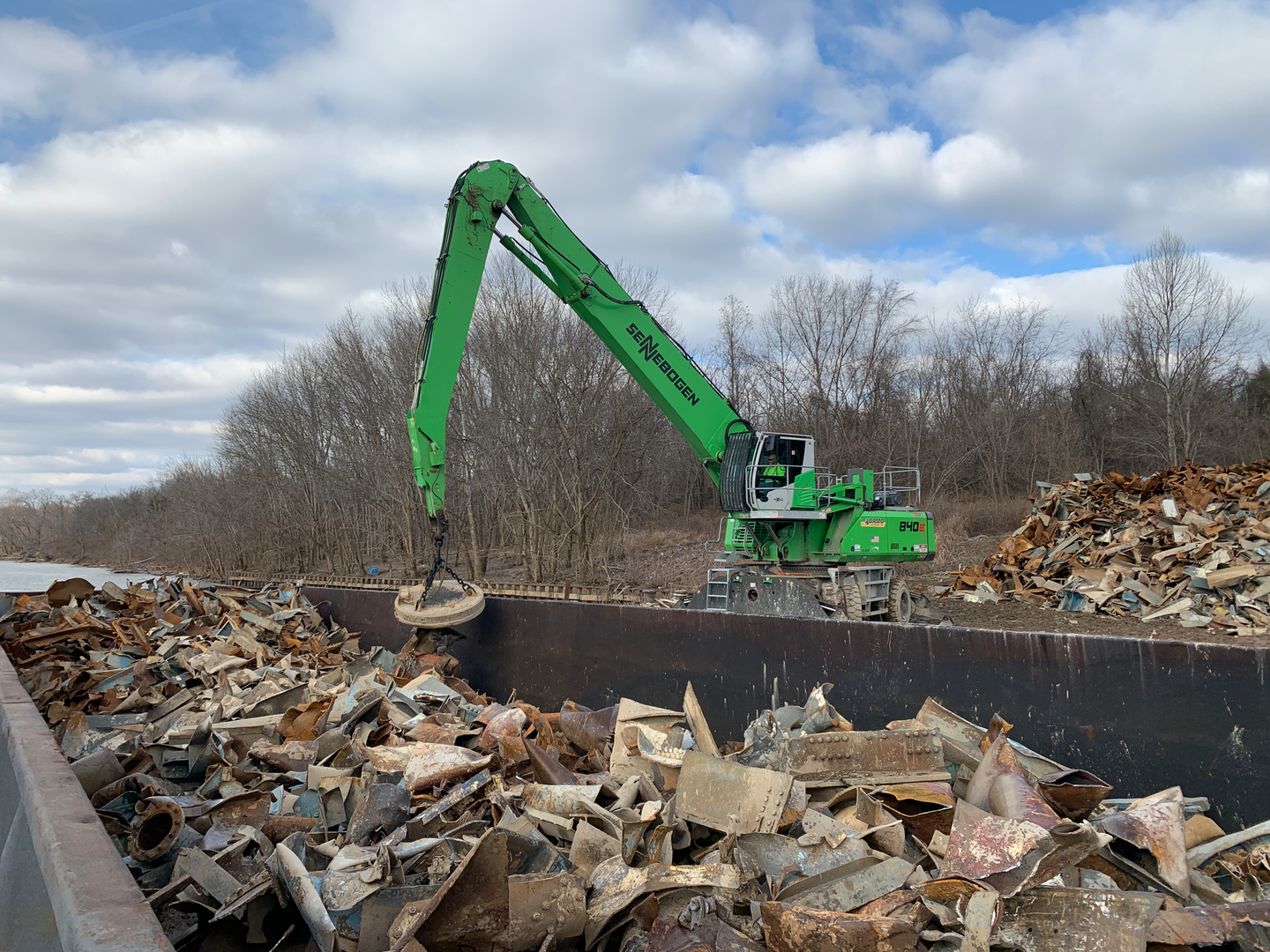 Adamo Group uses its Sennebogen material handlers with a magnet to pull rebar and other ferrous scrap from the piles of rubble, reducing landfilled material and adding an additional revenue stream.