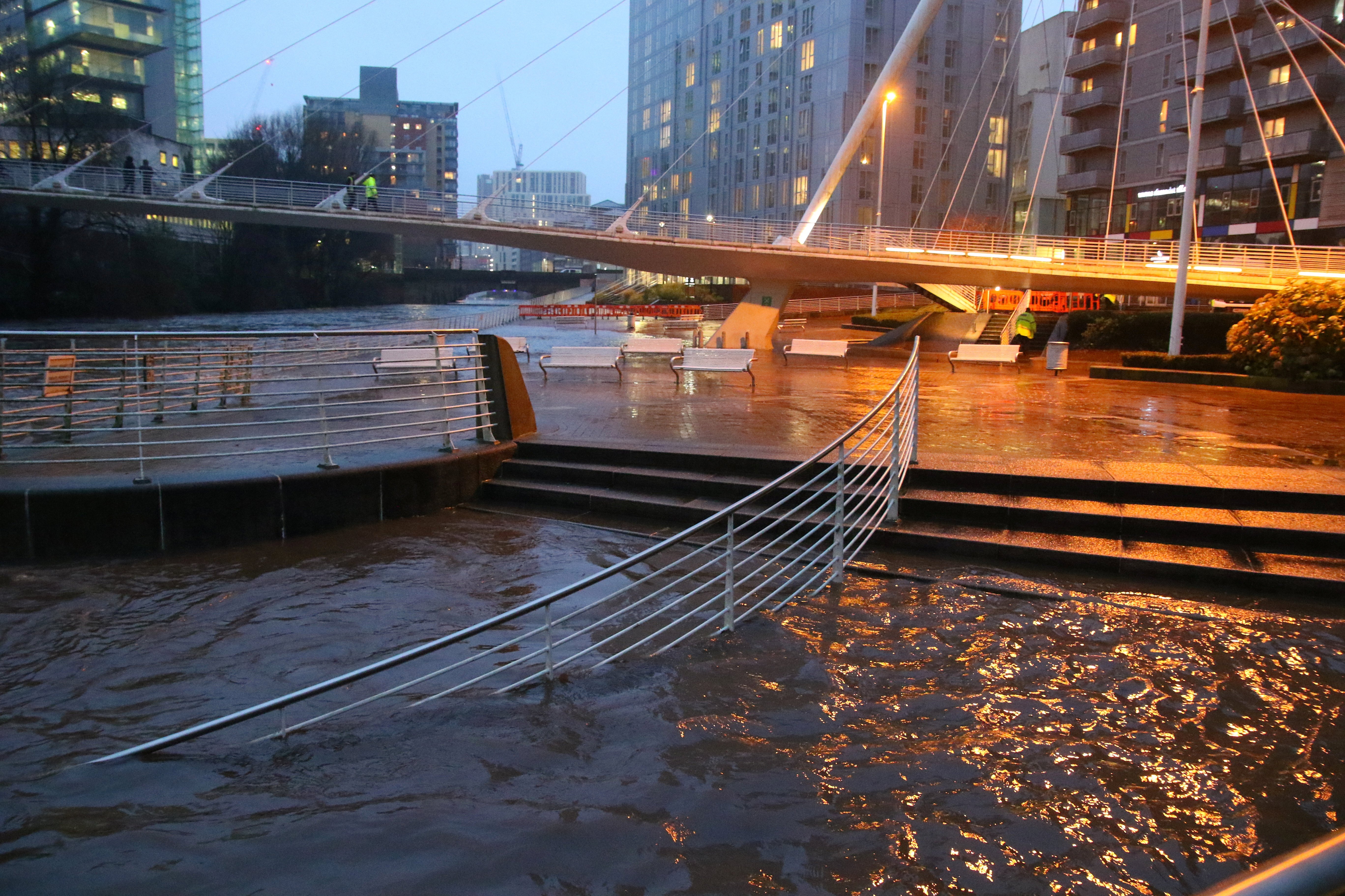 The River Irwell burst its banks at Salford in Greater Manchester just outside the Lowry Hotel last night