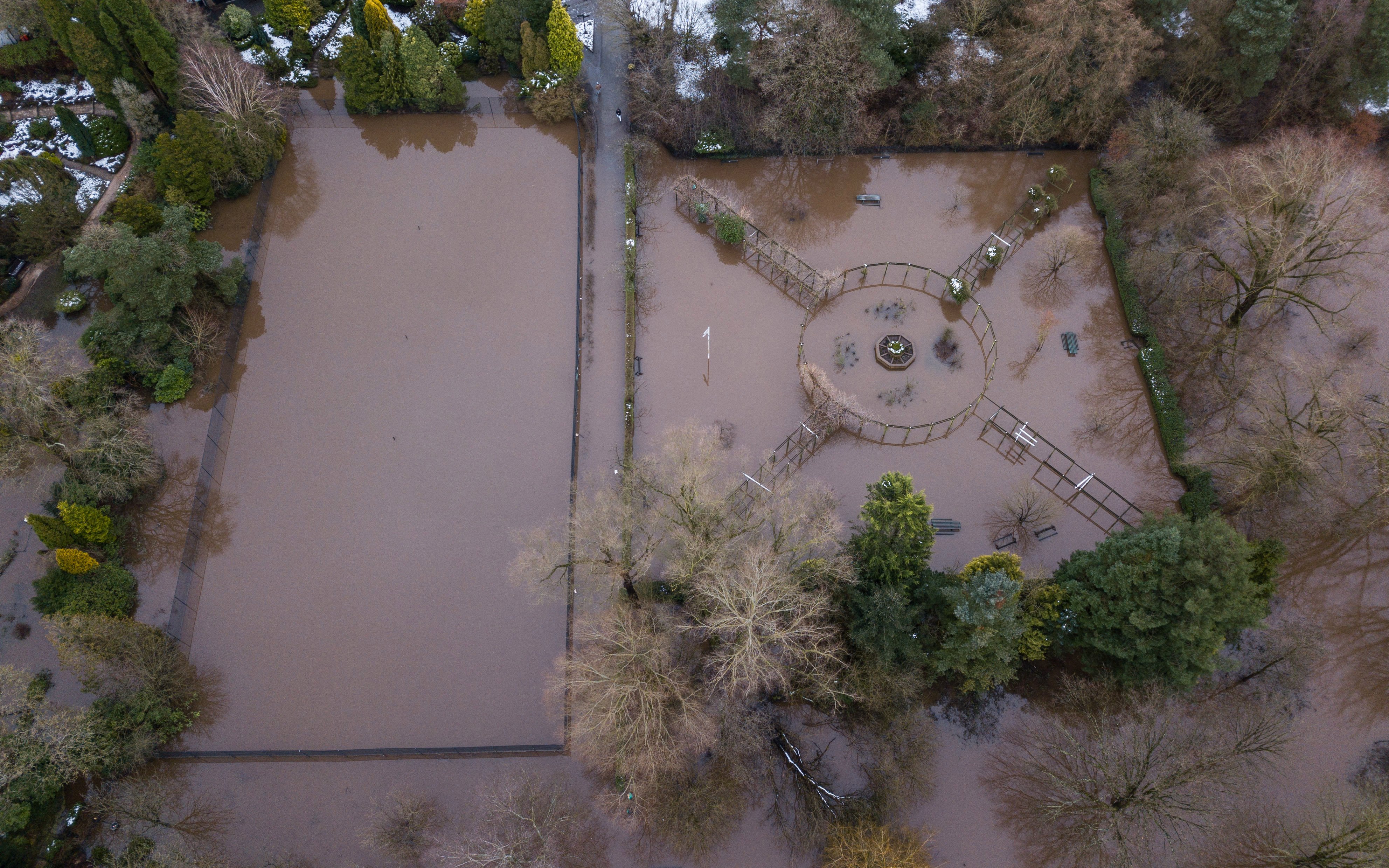 Land next to the River Mersey in Didsbury, Greater Manchester is seen completely flooded 