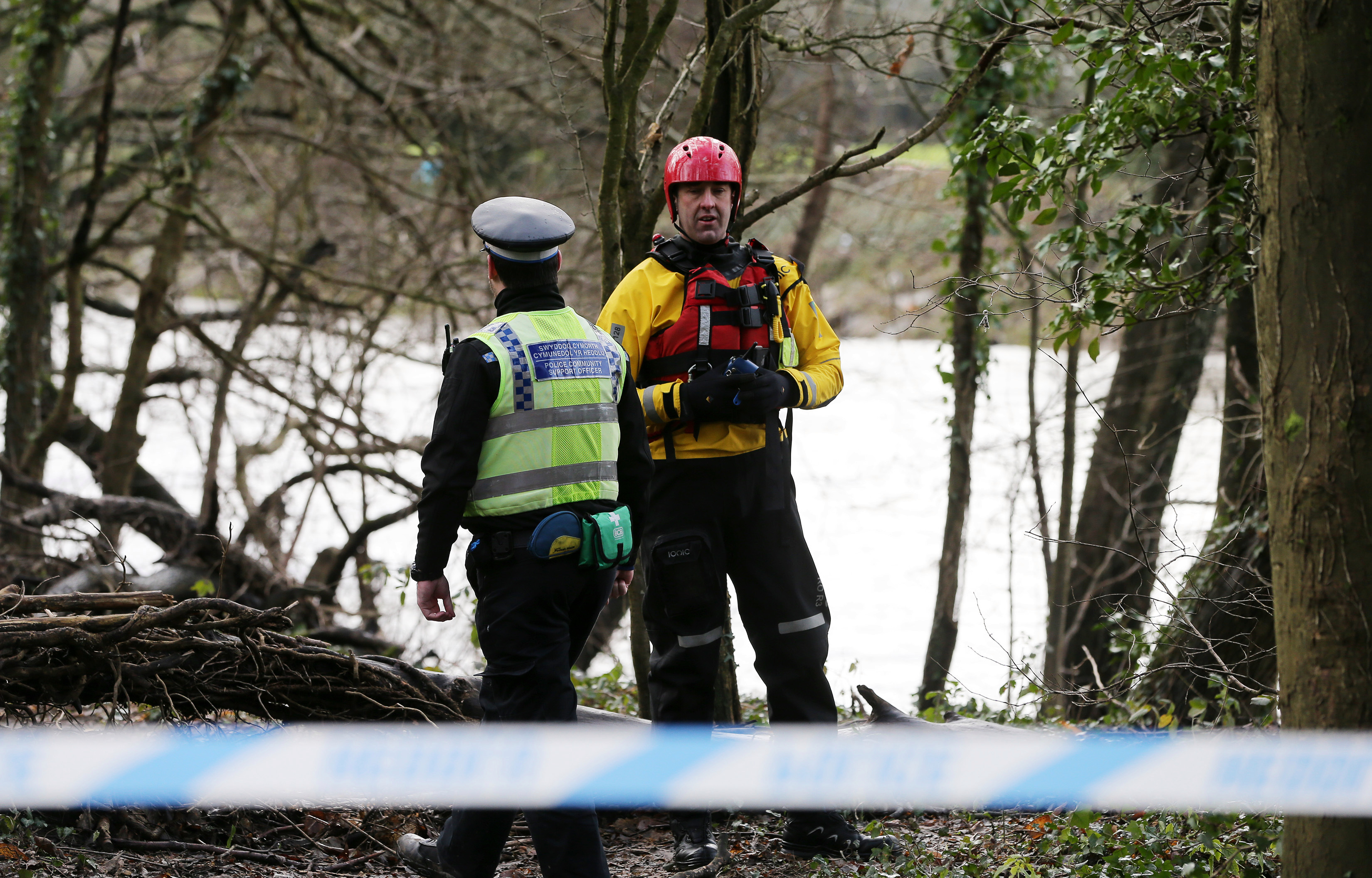 Police and emergency services at the scene in on the River Taff, in Blackweir, Cardiff after a body was discovered this morning at 9am