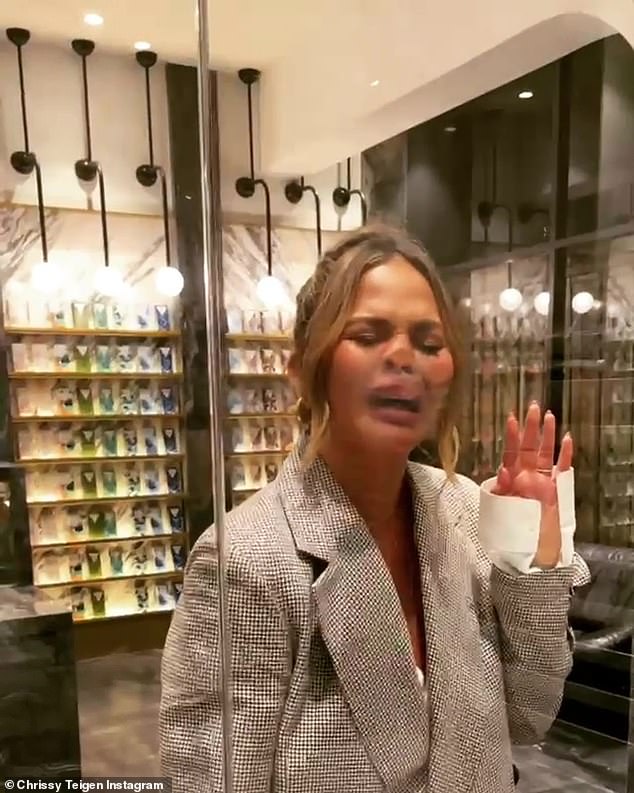 'Dream day': After a second, the camera pulled back to reveal the model with her face pressed against the glass as she fogged it up while leering at the cookies