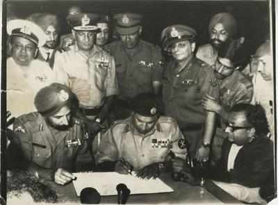 Lt General AAK Niazi (centre) signing the surrender documents in Dhaka on December 16,1971