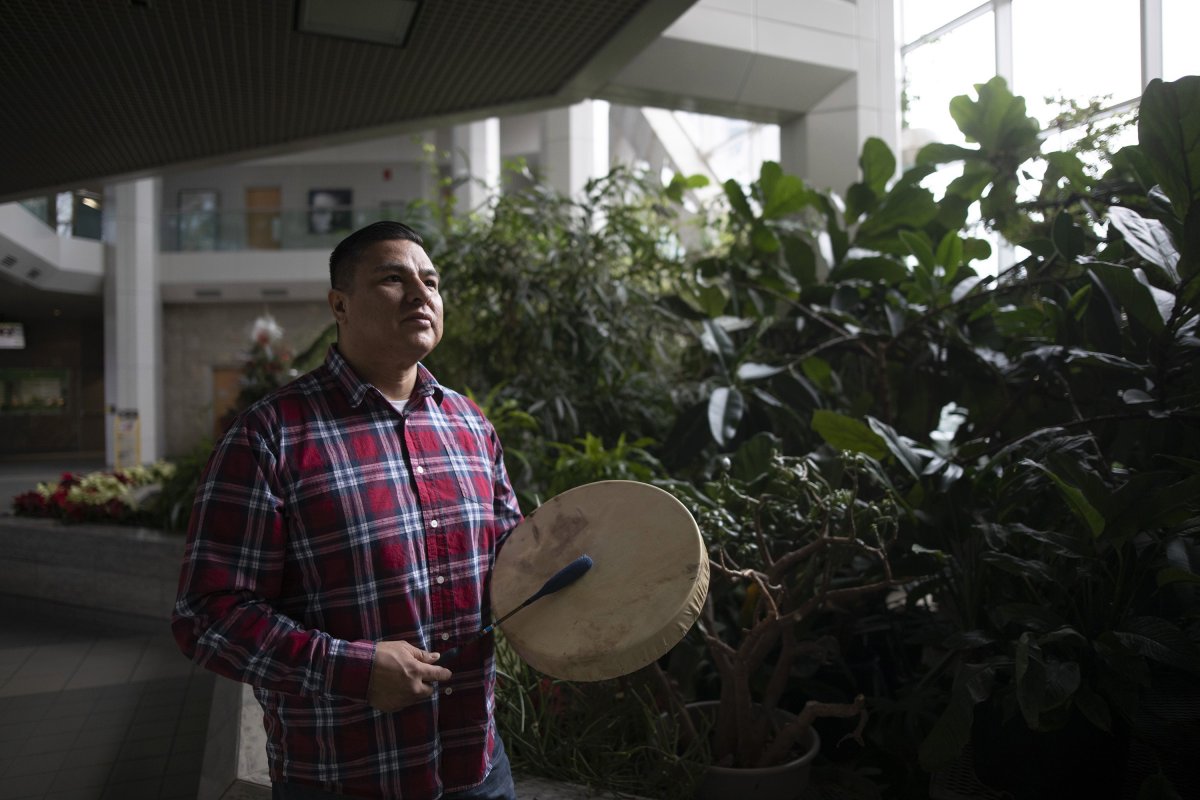 Young Spirt Singers member Jacob Faithful stands for a portrait inside the University of Saskatchewan in Saskatoon, Sunday, January, 20, 2019. THE CANADIAN PRESS/Kayle Neis