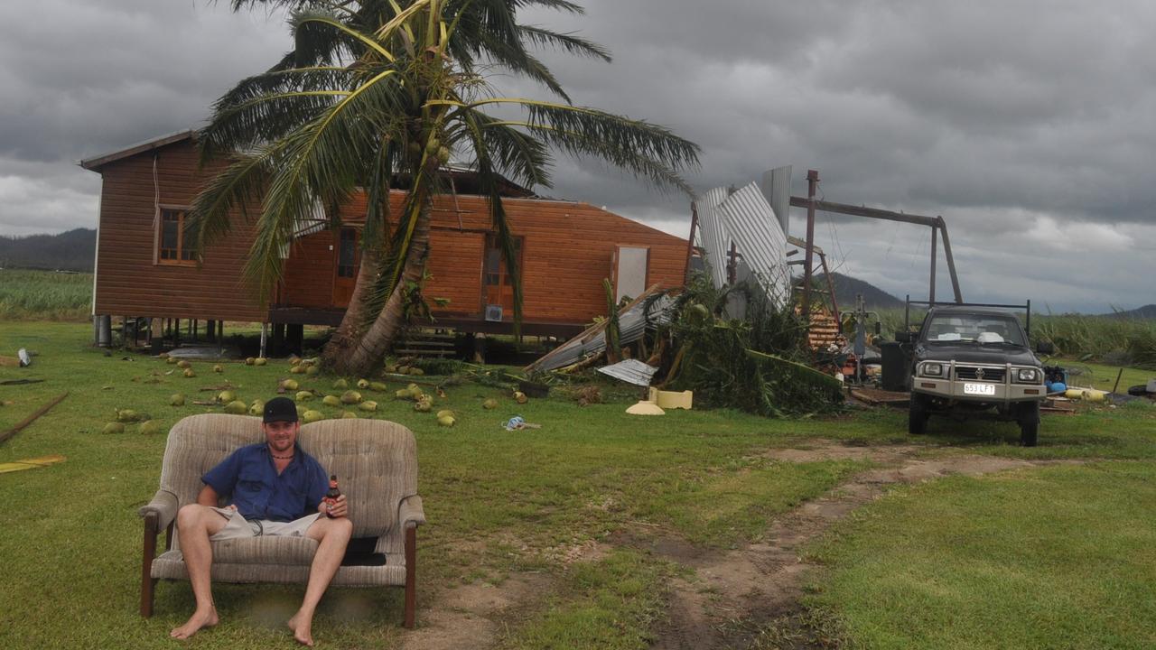 Severe Tropical Cyclone Yasi 2011. The aftermath, Mission Beach. Stuart McBeath who lives in East Feluga Rd near Mission Beach ended up taking refuge in his Hilux during Cyclone Yasi. Stuart is seen sitting outside his unroofed home. Severe Tropical Cyclone Yasi 2011. The aftermath, Mission Beach. Stuart McBeath who lives in East Feluga Rd near Mission Beach ended up taking refuge in his Hilux during Cyclone Yasi. Stuart is seen sitting outside his unroofed home.