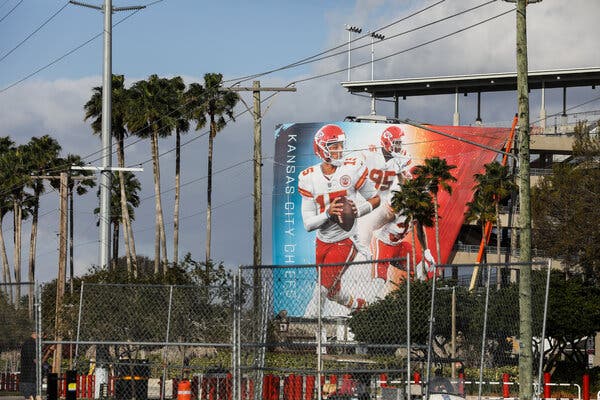 Signage for Super Bowl LV outside Raymond James Stadium in Tampa, Fla., on Monday.