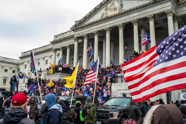 Members of the pro-Trump mob swarm the U.S. Capitol on January 6.