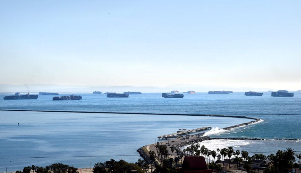Container ships queue outside Los Angeles and Long Beach.
