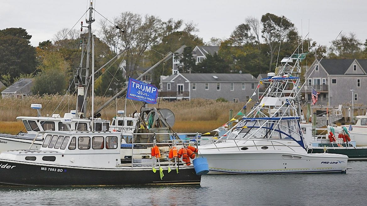 A Donald Trump flag flies off a boat in Green Harbor in Marshfield on Tuesday, Oct. 27, 2020. Greg Derr/ The Patriot Ledger