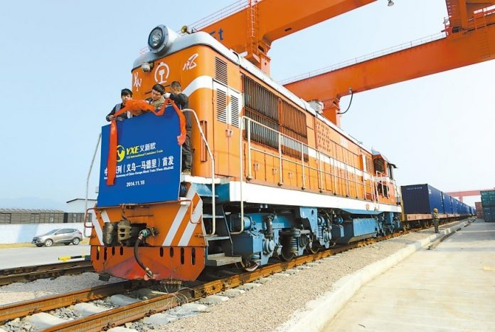 Yiwu-Xinjiang-Europe cargo The first Yiwu-Xinjiang-Europe cargo train sets off in November 2014. (Source: People’s Daily Online)