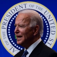 U.S. President Joe Biden delivers remarks before signing a 'Made in America' executive order at the White House in Washington on Jan. 25. In a bid to build supply chains less reliant on China, Biden is expected to sign another executive order in the coming days that lays out a new strategy for securing supply chains. | AFP-JIJI