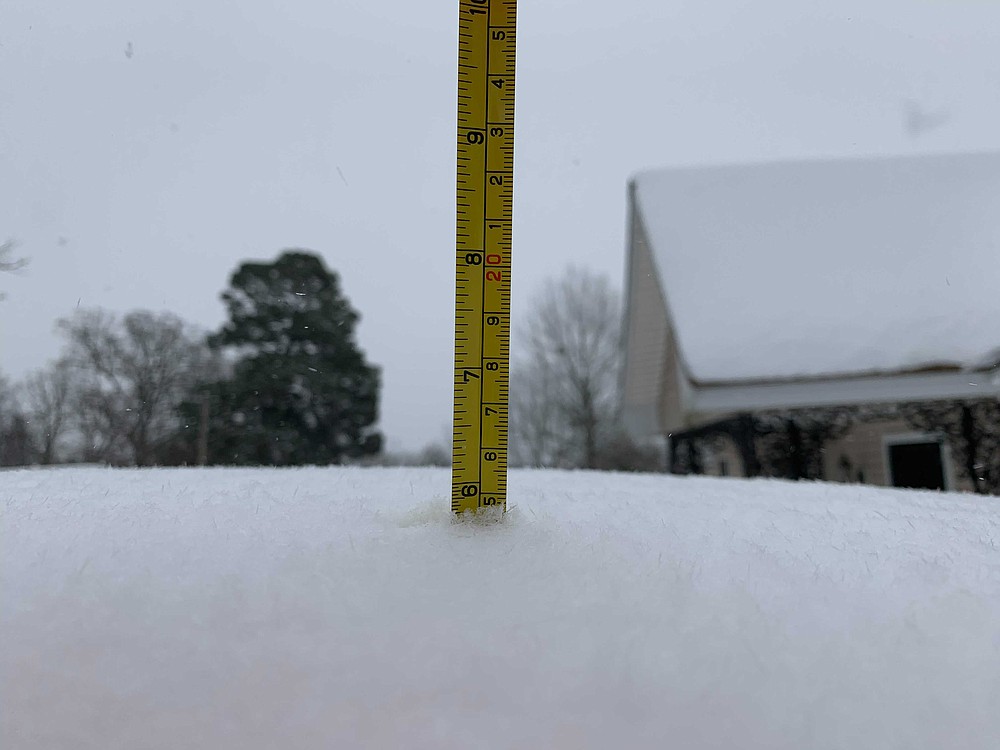 Snowfall in some parts of Little Rock was close to 6 inches deep around 11 a.m. Monday.