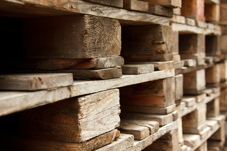 Wood pallets in warehouse.