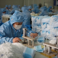 The COVID-19 pandemic made clear that there is too much reliance by the world on China for the production of many essential products, including personal protective equipment. | CHINA DAILY / VIA REUTERS
