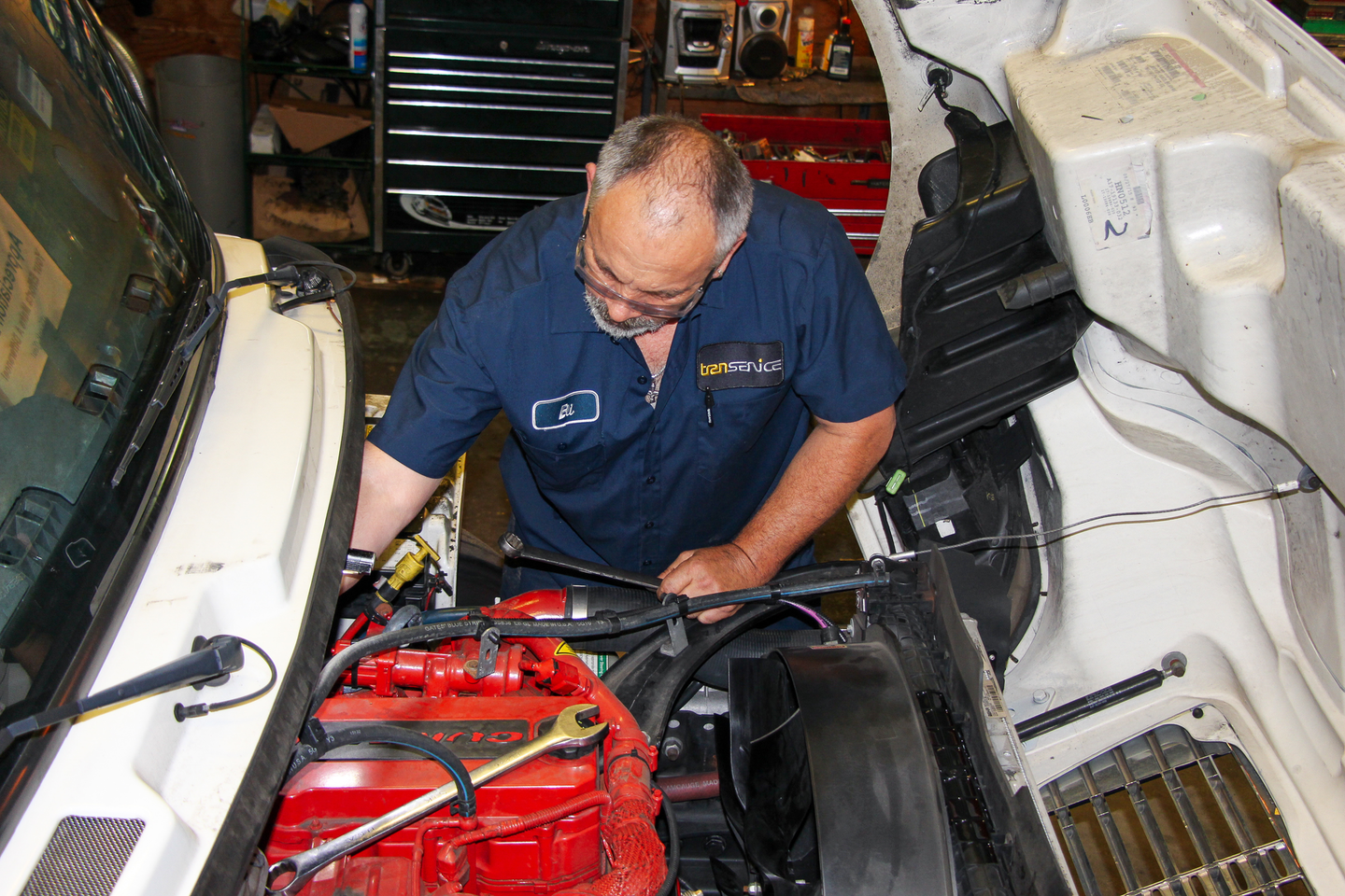 Mechanic servicing an engine