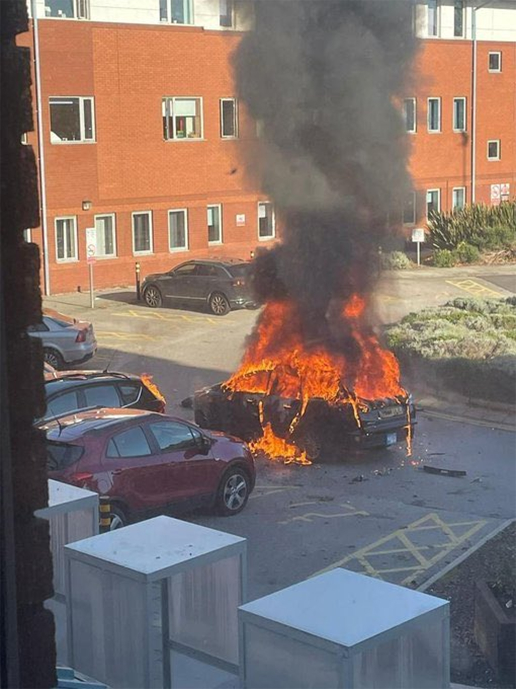 Graphic pictures and videos captured the private hire taxi with smoke and flames billowing yesterday
