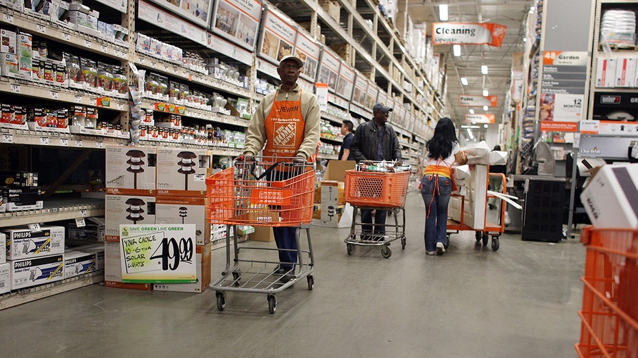 People shop at a Home Depot store May 19, 2009, in the Brooklyn borough of New York City.