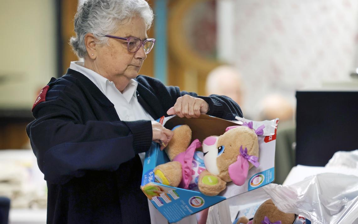 Maj. Ronda Tamayo sorts through donated toys at the Salvation Army location in Moorhead on Wednesday, Nov. 24, 2021.
David Samson / The Forum