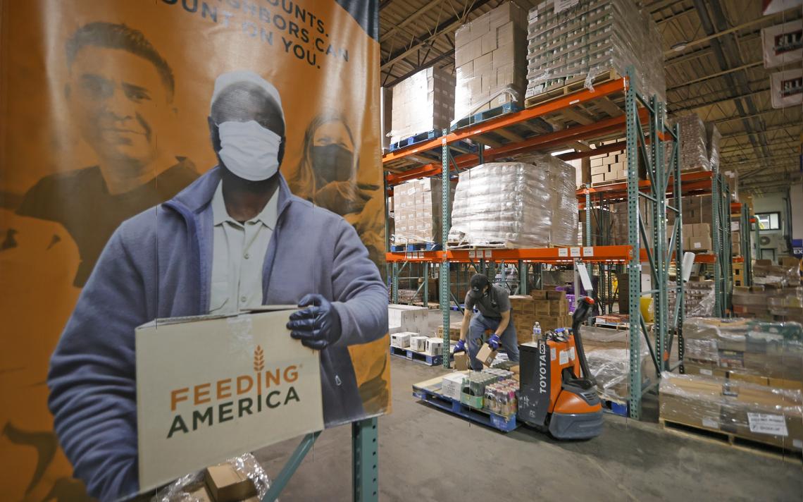 Isaac Romero loads a pallet with food items at the Great Plains Food Bank in Fargo on Friday, Nov. 19, 2021.
David Samson / The Forum