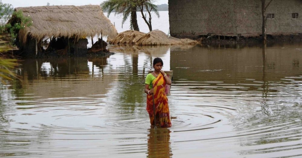 woman walking in flood