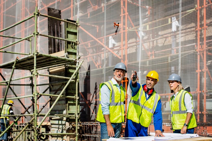A group of workers at a construction site.