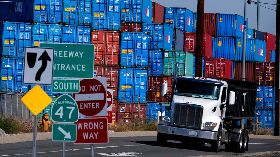 Cargo containers sit stacked at the Port of Los Angeles, Wednesday Oct. 20, 2021 in San Pedro, California.
