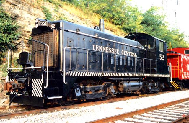 A Tennessee Central diesel locomotive used to pull freight trains. A caboose is attached.
(Photo: Tennessee Central Railway Museum)