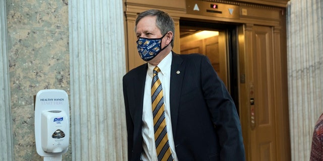 Sen. Steve Daines, R-Mont., arrives for votes during a rare weekend session to advance the confirmation of Judge Amy Coney Barrett to the Supreme Court, at the Capitol in Washington. (AP Photo/J. Scott Applewhite)