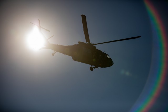 Soldiers with 3rd Assault Helicopter “Nightmare” Battalion, 1st Aviation Regiment, 1st Combat Aviation Brigade, 1st Infantry Division, provide an aerial tour from a UH-60 Black Hawk helicopter to Maj. Gen. Heidi J. Hoyle, commanding general of Military Surface Deployment and Distribution Command, during her visit to the port of Alexandroupoli, Greece, Nov. 20, 2021. The U.S. Army’s work at the port has significantly enhanced interoperability within NATO and the readiness of our forces within the alliance through regular exercises.
