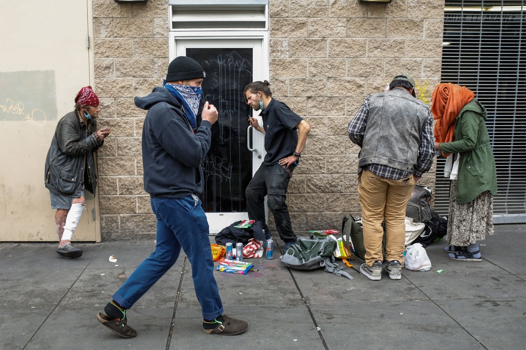 Homeless people on the sidewalk in San Francisco on May 17, 2021.