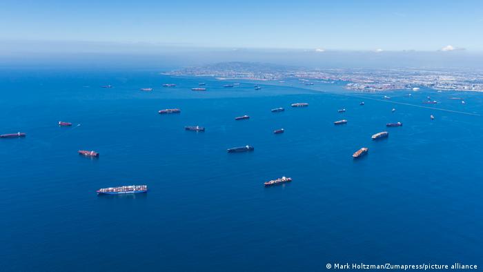Container ships waiting to get into the Port of Los Angeles and Long Beach to unload