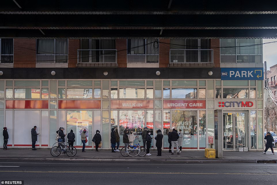 Biden acknowledged that there is a lack of at-home testing, saying he wished he had ordered more moths ago before people, like those seen here, had to wait in line at an urgent care center in Queens for a test