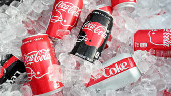 cans of coke in ice