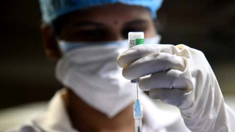 A healthcare worker readies a COVID-19 vaccine for administration at a public healthcare centre in Navi Mumbai, Maharashtra. (KK Choudhary/BCCL Mumbai)