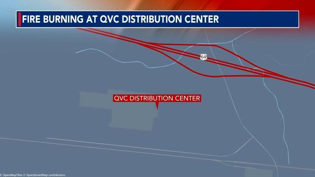 Fire burning at QVC distribution center