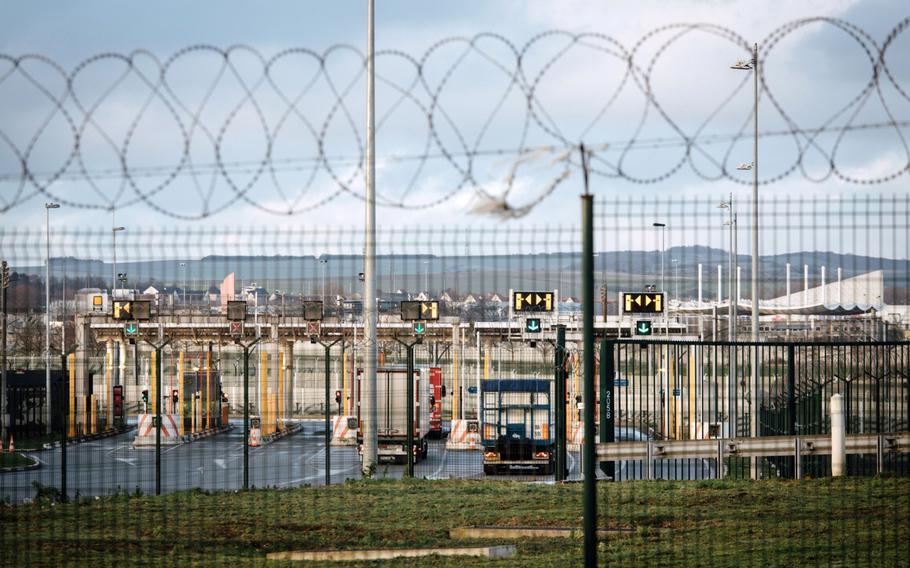 Haulage trucks wait at toll gates to enter the channel tunnel, operated by Getlink, in Calais, France, on Dec. 31, 2020.
