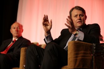 Magellan co-founder Chris MacKay (right) has thrown his support behind the troubled investment firm.