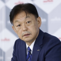 Murata Manufacturing Co. President Norio Nakajima at a news conference on Oct. 12 | BLOOMBERG