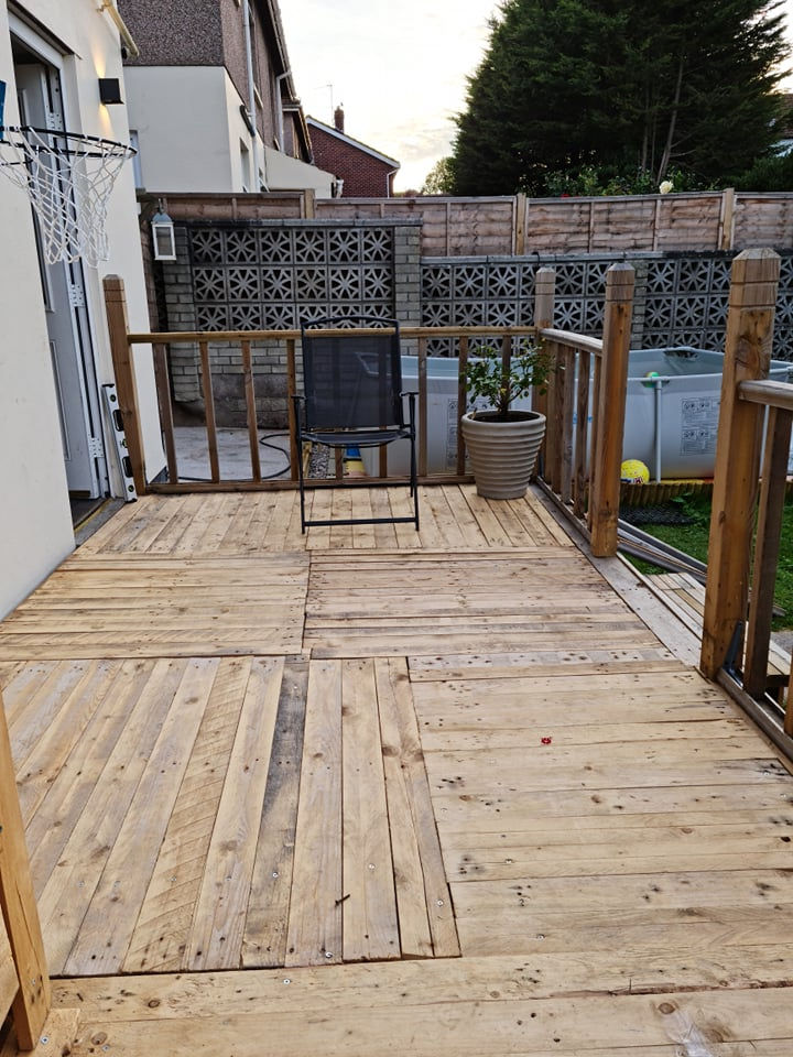 The decking is made entirely out of wooden pallets, with the only cost being the £10 delivery fee