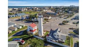 Once isolated, the Fenwick Island Lighthouse is now a part of the Town of Fenwick Island, Delaware. 
(Photo: lchomes.de.com)