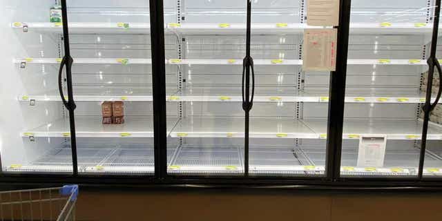 Empty commissary shelves at Yokota Air Base, Japan.