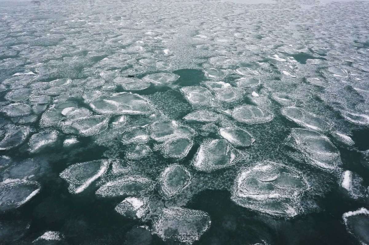 Lake Michigan is covered with snow and ice in Chicago, Monday, Jan. 17, 2022.