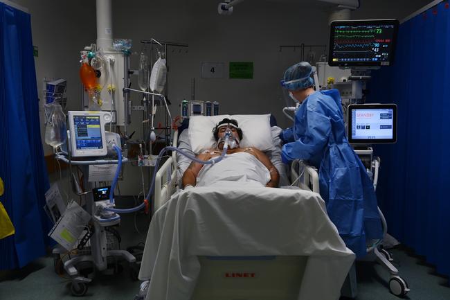 A supplied image of ICU Registered Nurse Shaunagh Whelan caring for a COVID-19 positive patient in the ICU of St Vincent’s Hospital n Sydney.