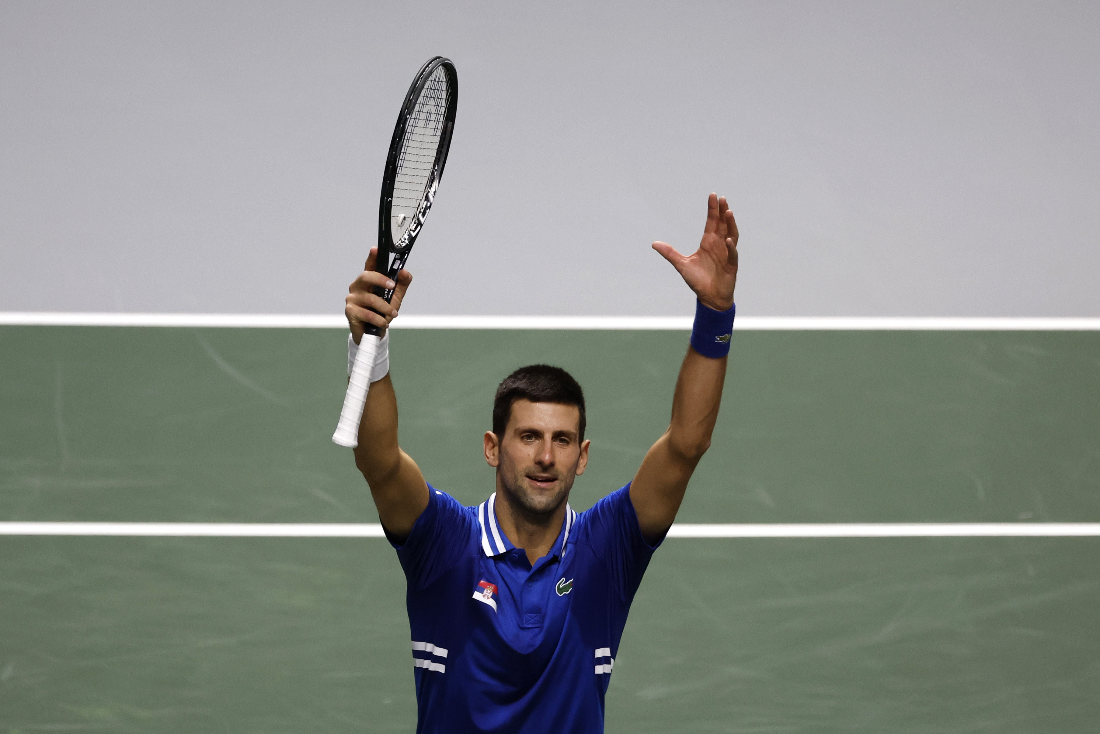 Tennis - Davis Cup Semi-Finals - Serbia v Croatia - La Caja Magica, Madrid, Spain - December 3, 2021 Serbia's Novak Djokovic celebrates winning his match against Croatia's Marin Cilic REUTERS/Susana Vera