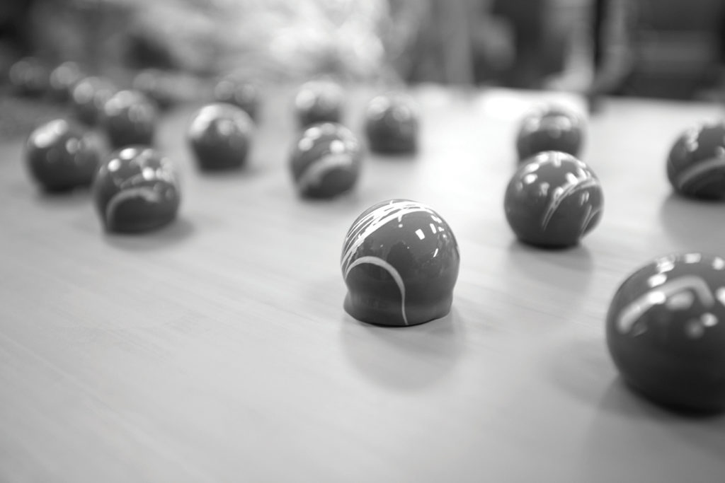 Norman Love chocolates in black and white photography