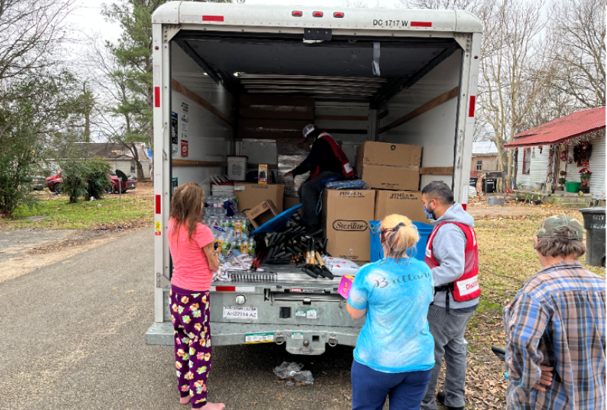 Residents of Trumann, Arkansas, connect with Red Cross personnel in the wake of a tornado that ripped through the town Dec. 10.