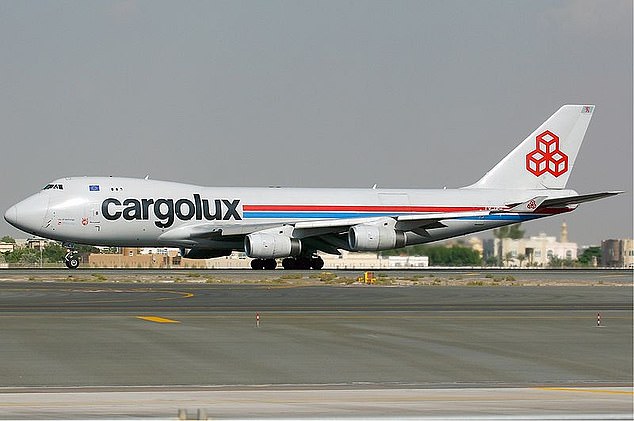A stowaway has miraculously survived a brutal journey from South Africa to the Netherlands while hiding in the front wheel section of a cargo plane. The man was discovered squeezed into the wheel section under the fuselage of a Cargolux Boeing 747 freight plane at Amsterdam's Schiphol airport earlier today, according to Dutch military police (stock pic)