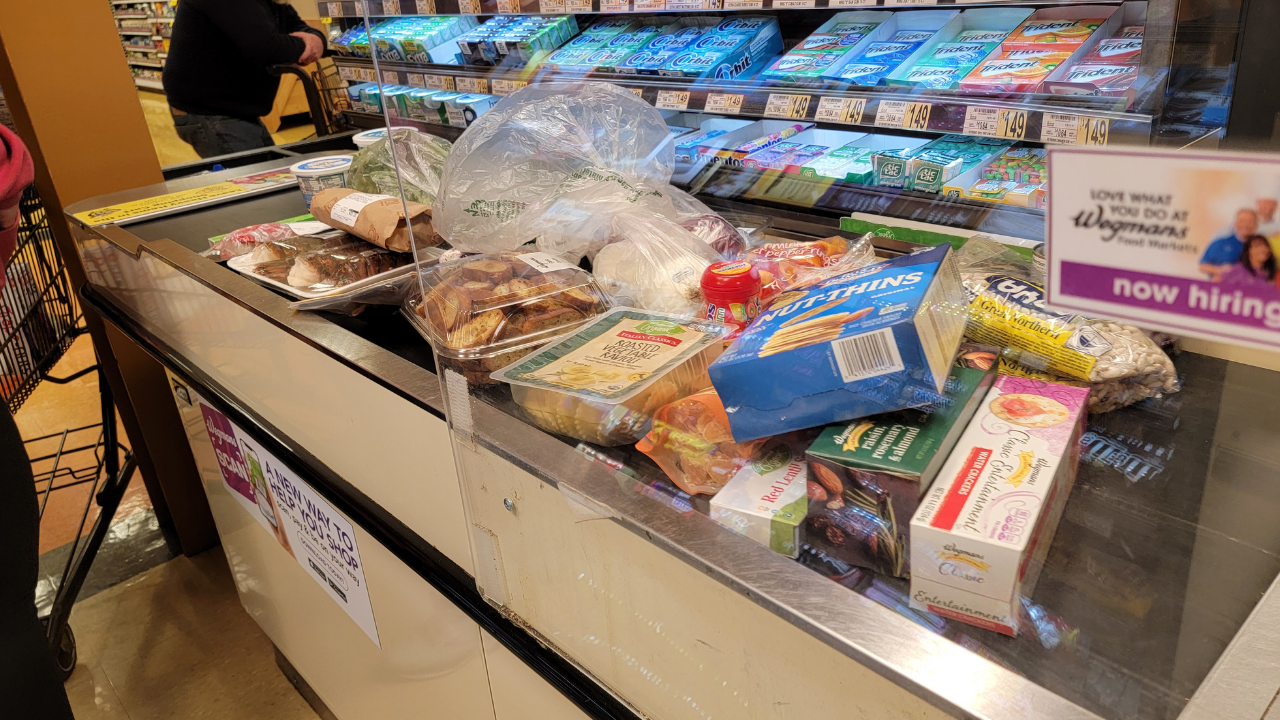 Wegmans grocery store checkout line filled with products that have faced supply chain issues