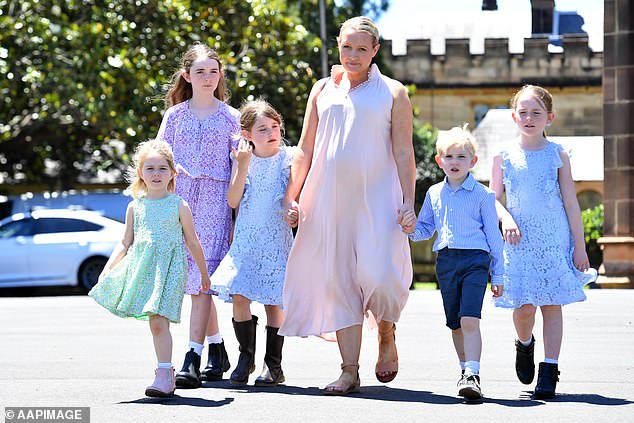 She called on NSW Premier Dominic Perrottet for help, who also has seven children. Pictured is Dominic's wife Helen and five of the couple's seven children