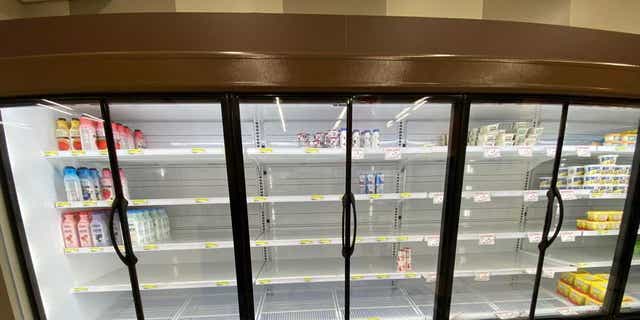 Empty commissary shelves at Yokota Air Base, Japan.