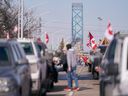 COVID-19 mandate protesters block the roadway at the Ambassador Bridge border crossing with the U.S. in Windsor, Ont., on Feb. 9, 2022. 